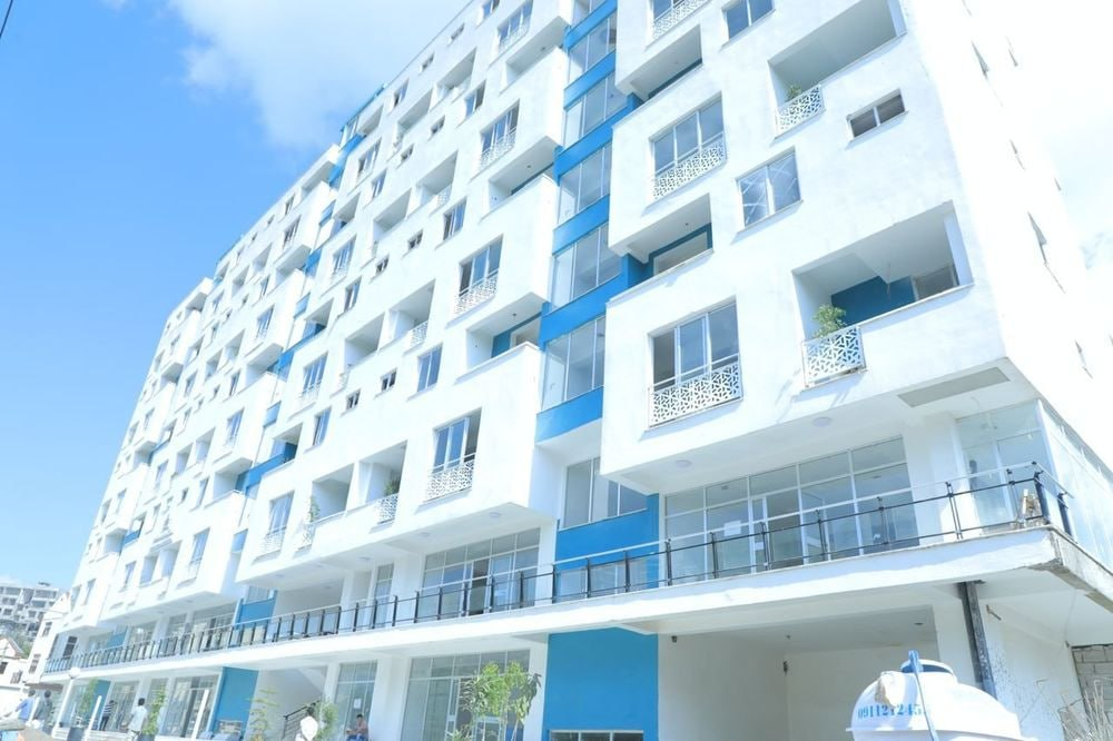 FHC white and blue apartment building